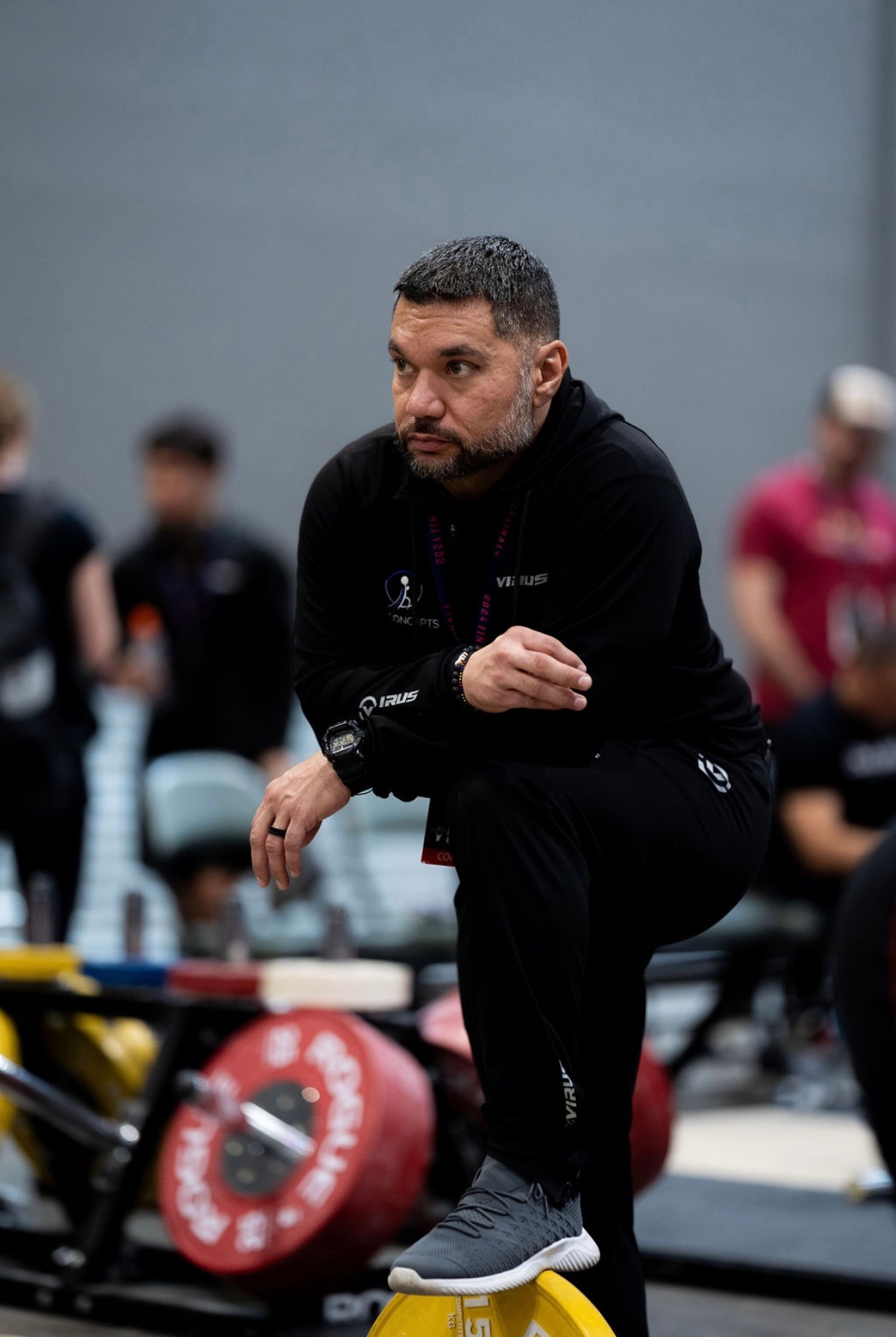 Coach Daniel Camargo at a weightlifting competition